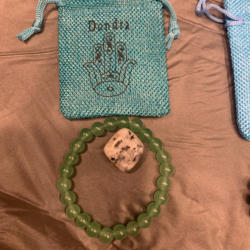 Handmade beaded bracelets and custom bags. Proce dependent on stone